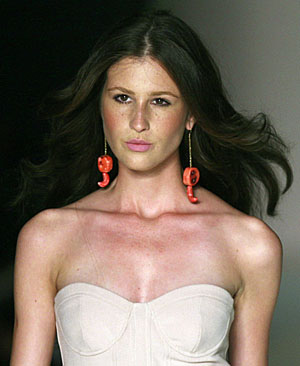 Model presents creation from Teca's 2010 spring/summer collection during Fashion Rio Show in Rio de Janeiro